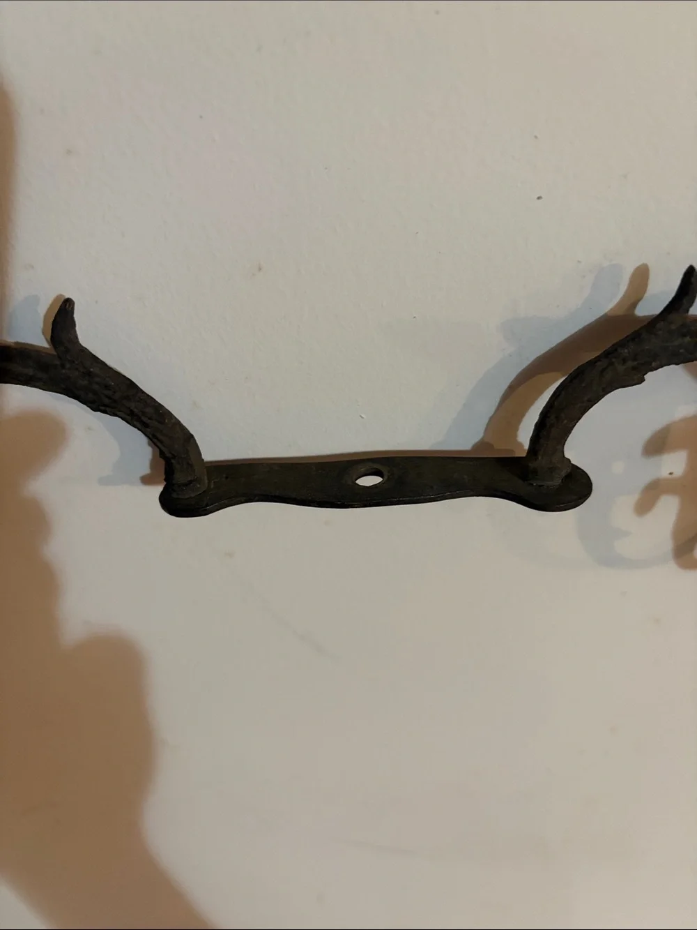Cast iron coat rack with Cherubs. Mid century or earlier?